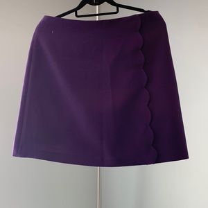 Club Monaco  mini skirt with scallop detail. Size 12, purple.